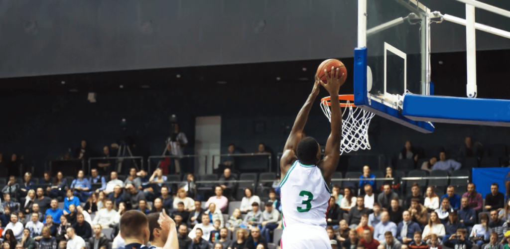 basketball-player-throws-a-ball-into-the-hoop-in